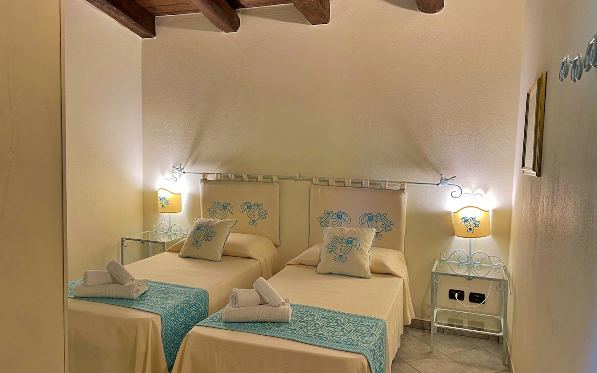 Villa Alghero 3, Schlafzimmer 2 (4) Villa Alghero 3, Schlafzimmer 2 (4)